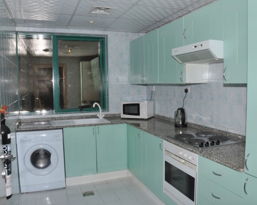 Pearl Residence Apt в Дубае: апартаменты с кухней и бассейном