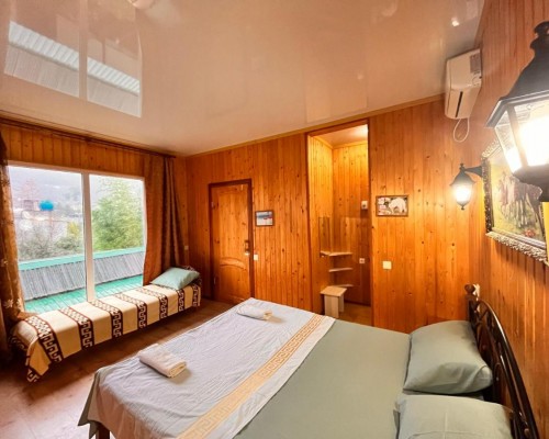Oganyan Guest House в Гагре: гостевой дом с общей кухней