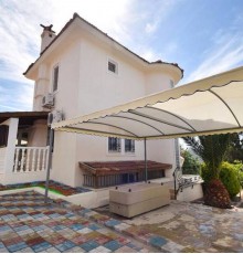 korunakli pembe villa